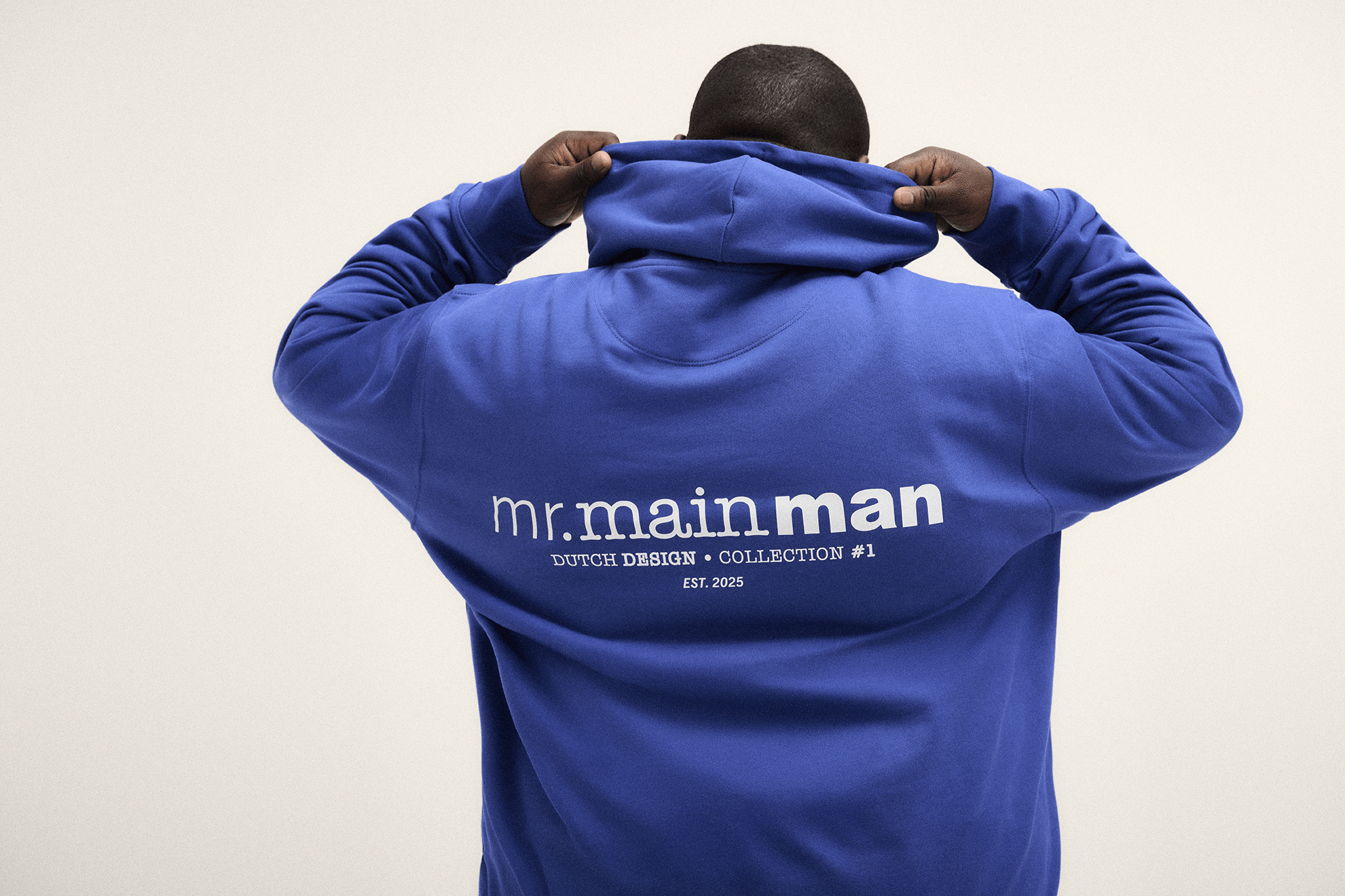 Model is wearing The hoodie in bright blue, offering a relaxed fit and cozy fabric for plus-size comfort.