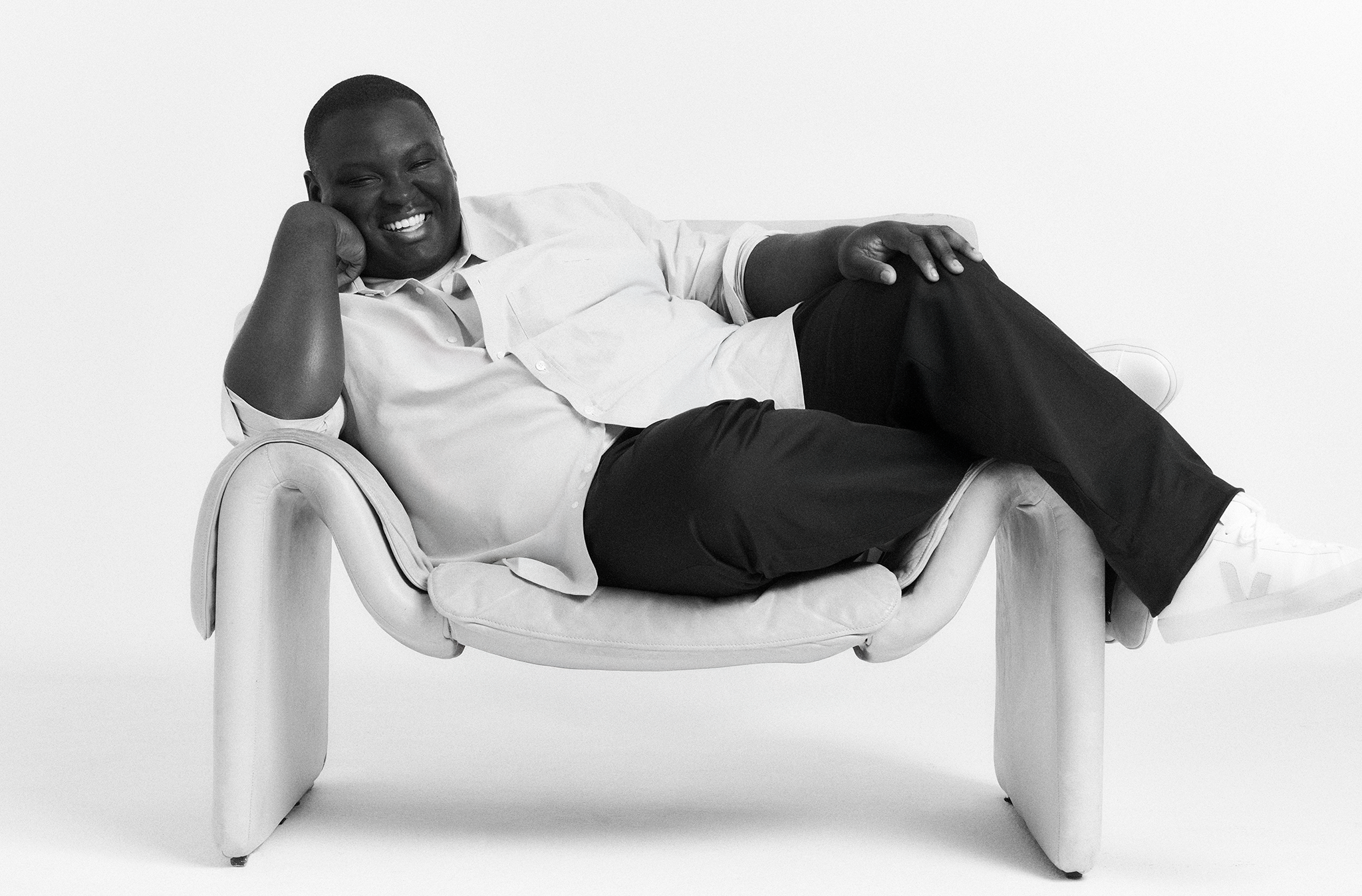 MrMainMan Model in Oxford shirt On chair Black and White