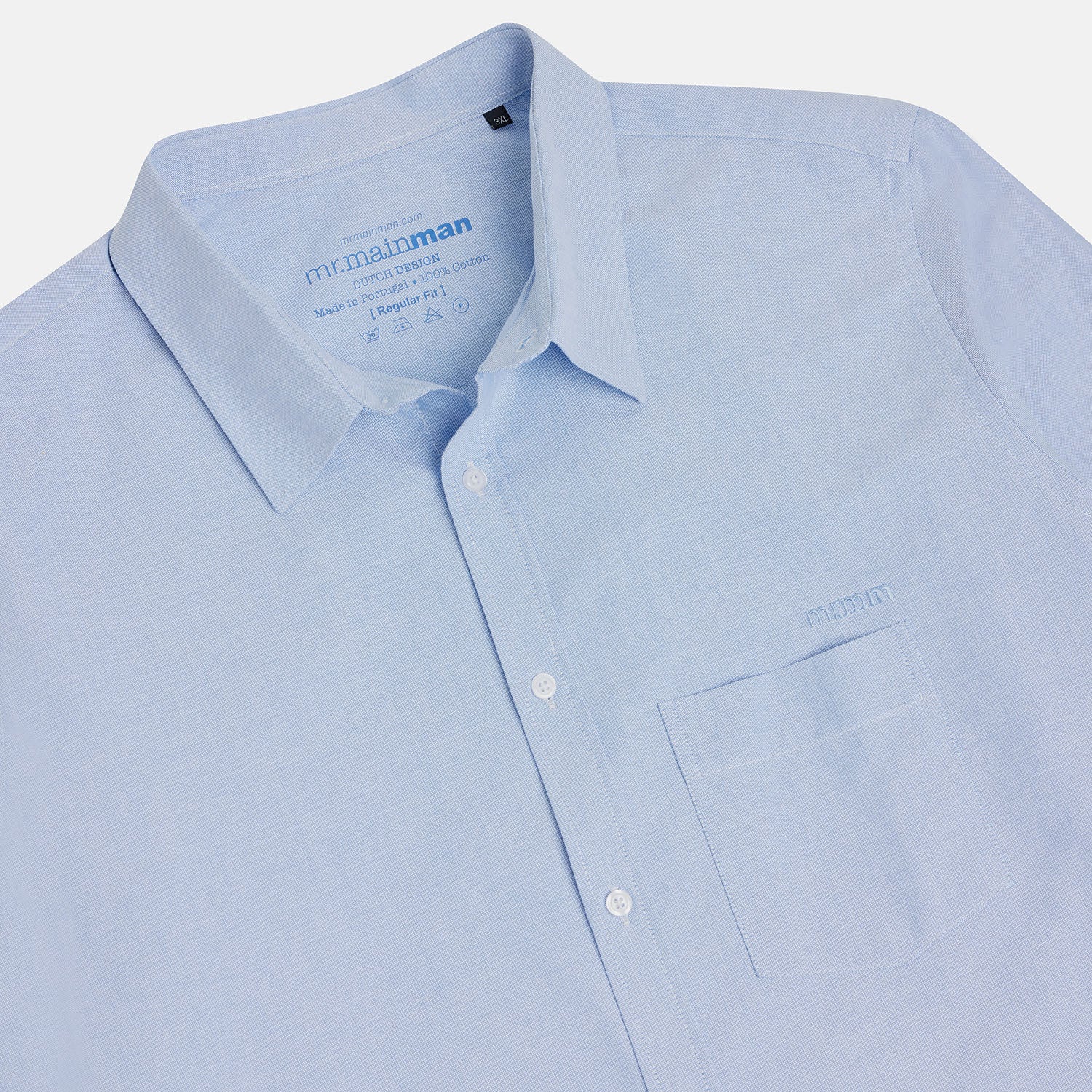 Collar and placket detailed view of Light Blue Oxford Shirt for plus-size men, classic fit